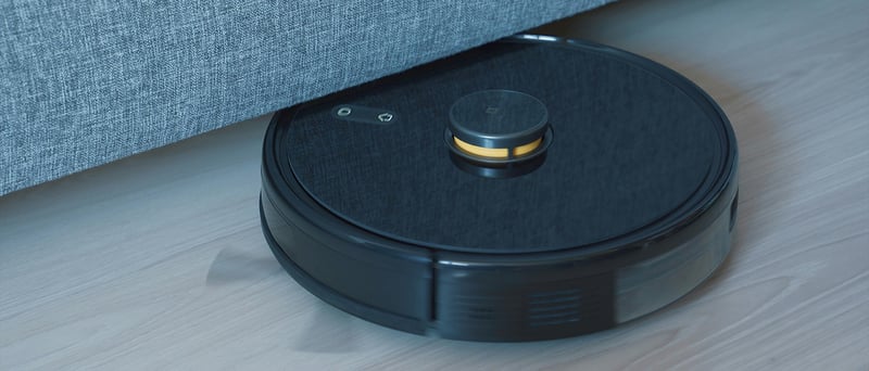Robotdammsugare som rengör under en soffa