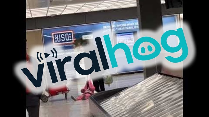 Dad Drags Daughter Through Airport || ViralHog